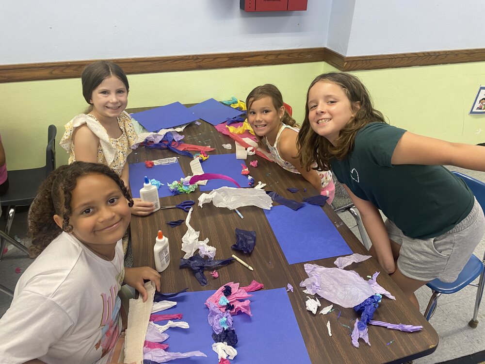 Children creating art together at Brookline Sprouts
